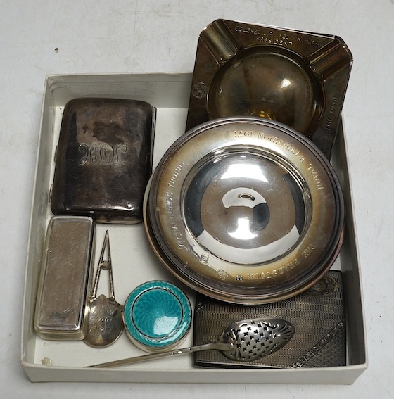 Small silver to include - two cigarette boxes, a William IV snuff box, an 18th century moat spoon, an enamelled pill box, a golfing pitch mark repairer?, two ashtrays and three Armada type dishes, 640g gross. Condition -